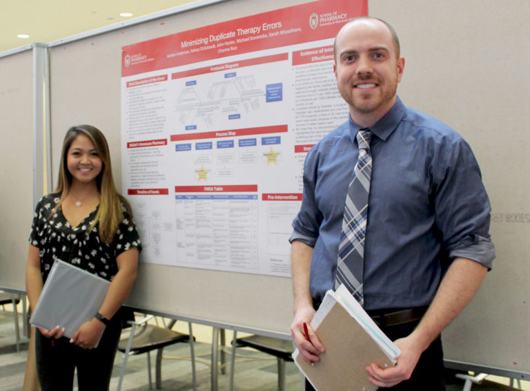 Pharmacy students Mike Konietzko and Charina Ruiz participate in the PharmD poster session