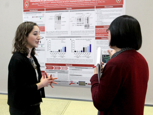 A PharmTox student presents her research at the annual poster session.