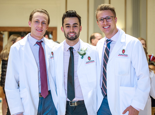 Pharmacy students pose together following the UW-Madison School of Pharmacy White Coat Ceremony