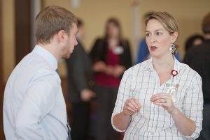 A PharmD student chats with a pharmacy manager at the annual career fair.